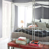 Benjamin Moore's 2118-50 Excalibur Gray in a bedroom. Shop gray/blue paint tones from 2018 color trends.