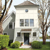 Benjamin Moore's OC-69 White Opulence on exterior of house. Shop soft white paint colors from 2018 color trends.