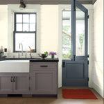 Benjamin Moore's 2112-40 Stone a warm gray on kitchen cabinets. Shop warm gray paint colors from 2018 color trends.